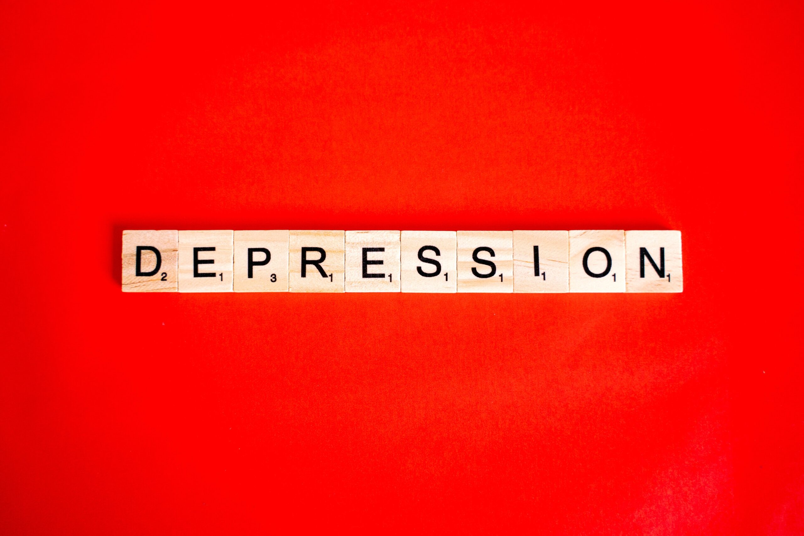 image of word depression using scrabble wooden letters